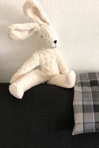 Preview wallpaper hare, toy, soft, sofa