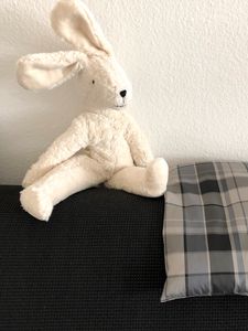 Preview wallpaper hare, toy, soft, sofa