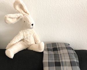 Preview wallpaper hare, toy, soft, sofa