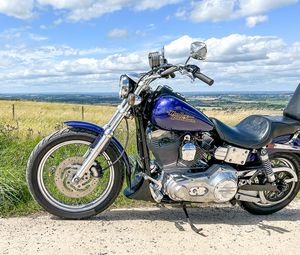 Preview wallpaper harley-davidson, motorcycle, bike, blue, field, sky