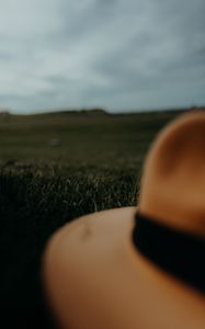 Preview wallpaper hat, brown, grass, lawn
