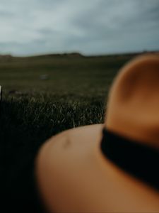 Preview wallpaper hat, brown, grass, lawn