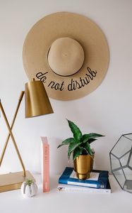 Preview wallpaper hat, inscription, words, lamp, book, decor