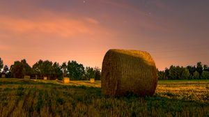 Preview wallpaper hay, stack, field, sunset, grass, sky
