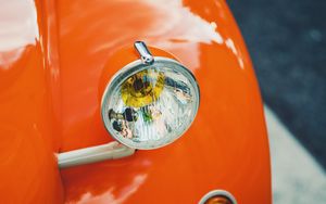 Preview wallpaper headlight, car, orange, retro