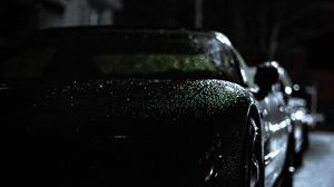 Preview wallpaper headlight, car, rain, darkness, front view