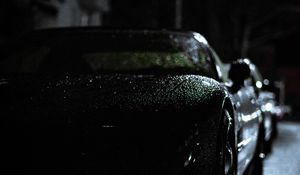 Preview wallpaper headlight, car, rain, darkness, front view