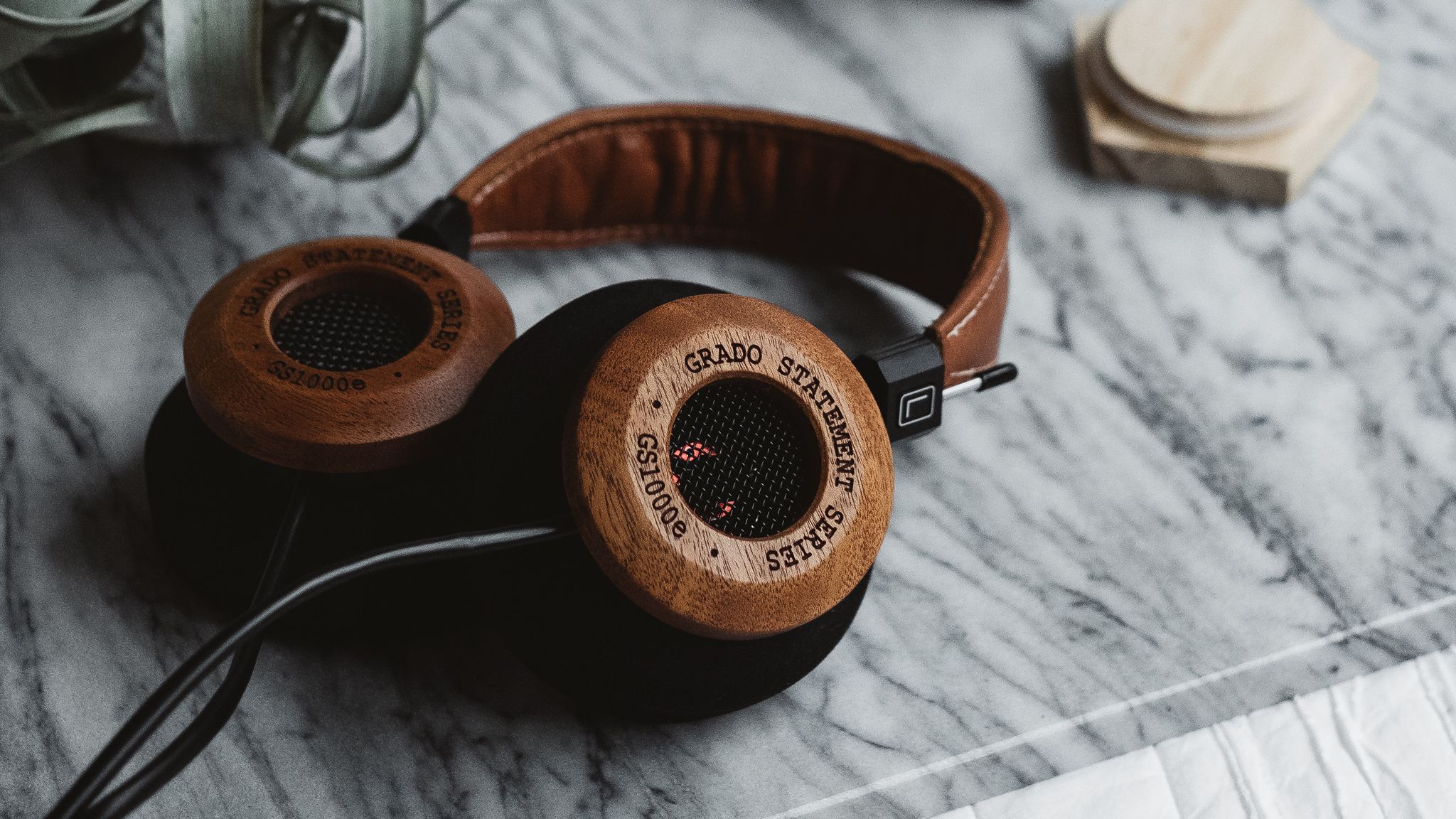2048x1152 Wallpaper headphones, audio, sound, table