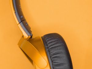 Preview wallpaper headphones, device, music, orange