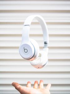 Preview wallpaper headphones, hand, levitation, audio, white