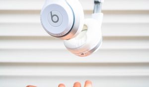 Preview wallpaper headphones, hand, levitation, audio, white