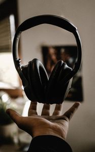 Preview wallpaper headphones, hand, toss, levitation, music