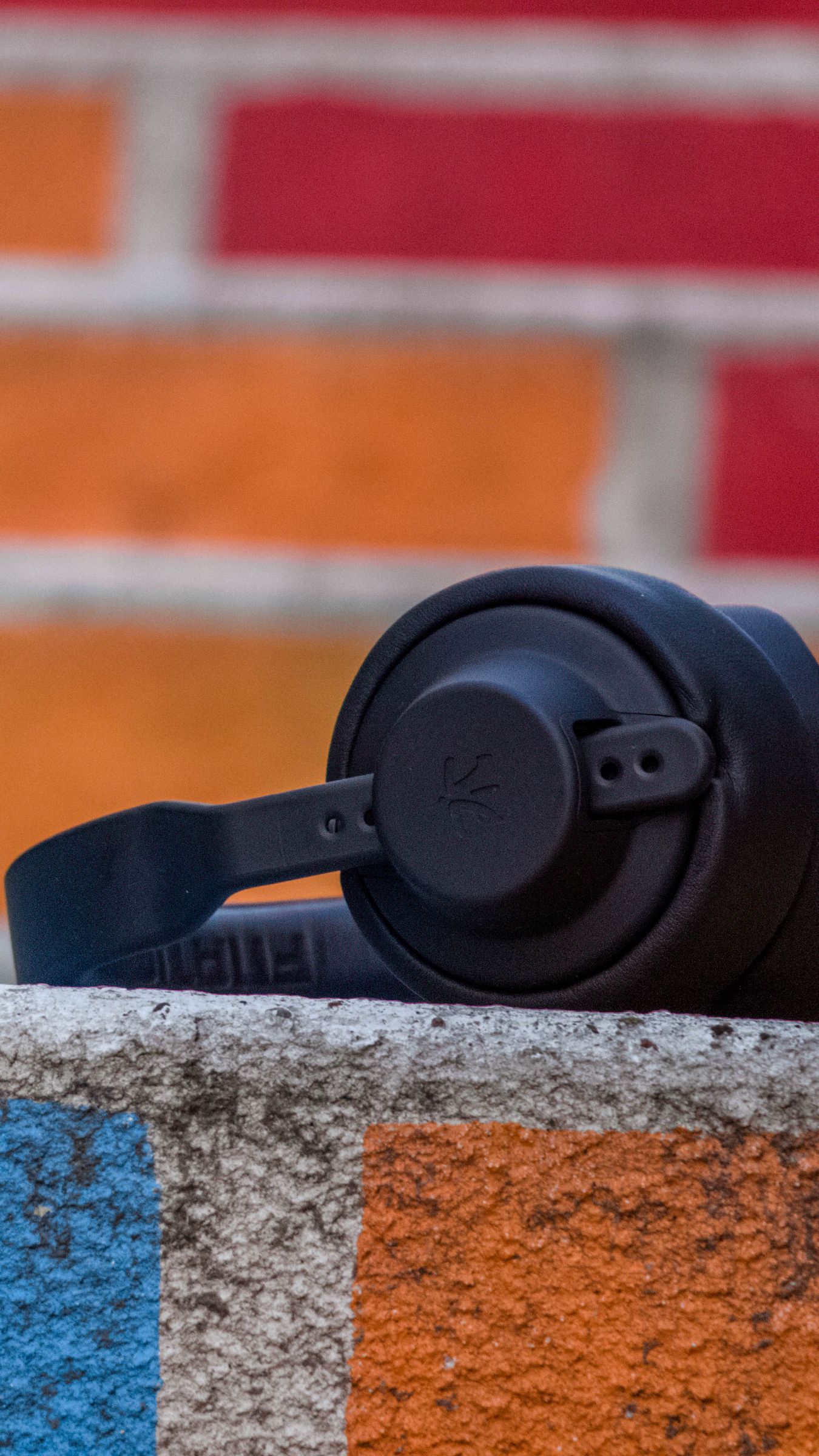 1350x2400 Wallpaper headphones, surface, stone