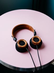 Preview wallpaper headphones, table, pink, audio