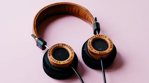 Preview wallpaper headphones, table, pink, audio