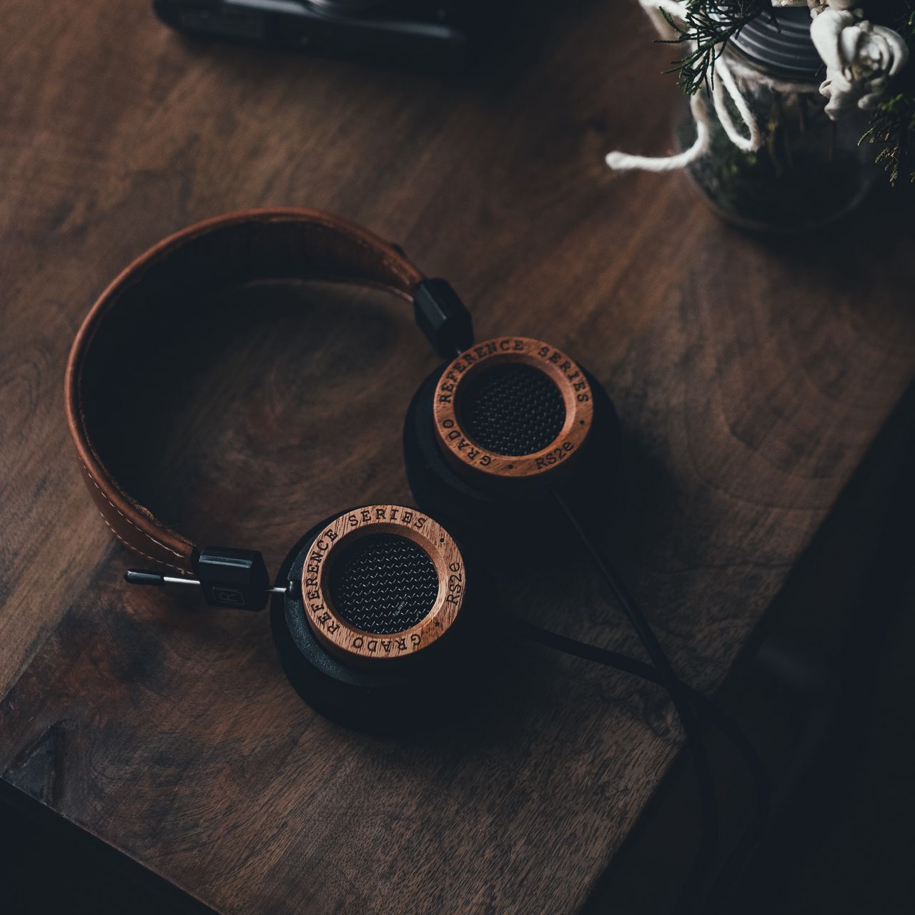 1280x1280 Wallpaper headphones, table, sound, wooden