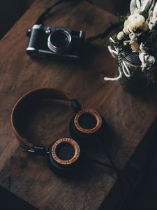 Preview wallpaper headphones, table, sound, wooden