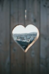 Preview wallpaper heart, city, view, hole