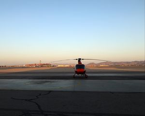 Preview wallpaper helicopter, asphalt, shadow