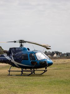 Preview wallpaper helicopter, blue, grass, field