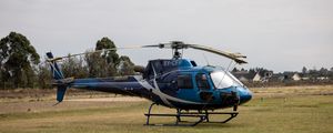 Preview wallpaper helicopter, blue, grass, field