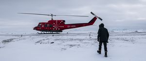 Preview wallpaper helicopter, man, snow, winter