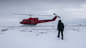 Preview wallpaper helicopter, man, snow, winter