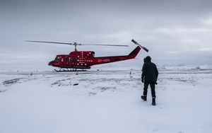 Preview wallpaper helicopter, man, snow, winter