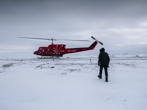 Preview wallpaper helicopter, man, snow, winter