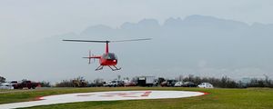 Preview wallpaper helicopter, runway, pad, fog, red