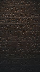 Preview wallpaper hieroglyphs, inscription, wall, texture, dark