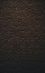 Preview wallpaper hieroglyphs, inscription, wall, texture, dark