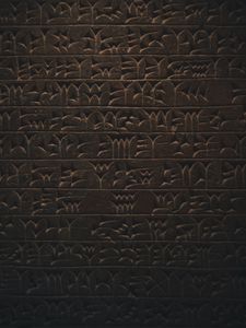 Preview wallpaper hieroglyphs, inscription, wall, texture, dark