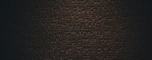 Preview wallpaper hieroglyphs, inscription, wall, texture, dark