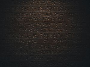 Preview wallpaper hieroglyphs, inscription, wall, texture, dark