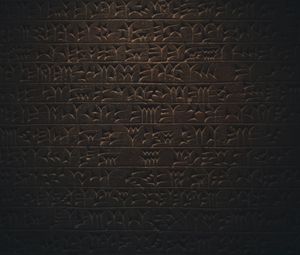 Preview wallpaper hieroglyphs, inscription, wall, texture, dark