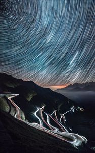 Preview wallpaper high-altitude road, night, light, stelvio, italy