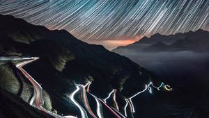 Preview wallpaper high-altitude road, night, light, stelvio, italy