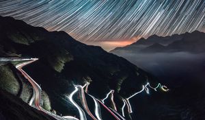 Preview wallpaper high-altitude road, night, light, stelvio, italy