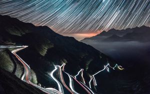 Preview wallpaper high-altitude road, night, light, stelvio, italy