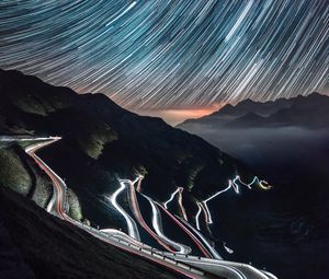 Preview wallpaper high-altitude road, night, light, stelvio, italy