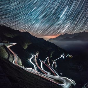 Preview wallpaper high-altitude road, night, light, stelvio, italy