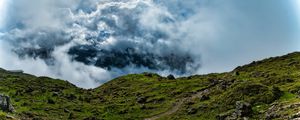 Preview wallpaper hill, field, stones, clouds, sky, landscape