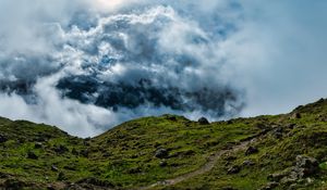 Preview wallpaper hill, field, stones, clouds, sky, landscape