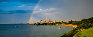 Preview wallpaper hill, field, water, rainbow, buildings, landscape