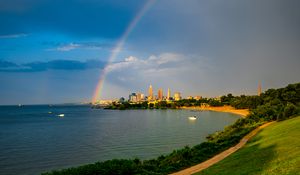 Preview wallpaper hill, field, water, rainbow, buildings, landscape