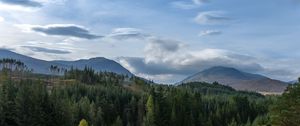 Preview wallpaper hill, forest, trees, sky, clouds