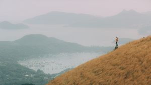 Preview wallpaper hill, girl, view, bay, fog