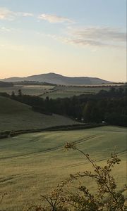 Preview wallpaper hill, grass, arable land, landscape