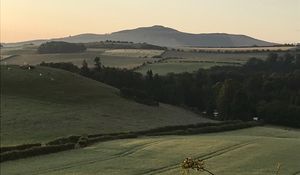 Preview wallpaper hill, grass, arable land, landscape